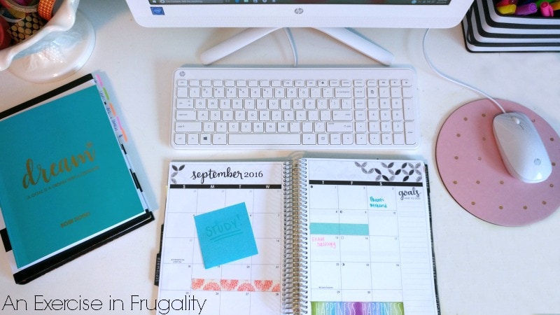 teacher desk with computer and agenda