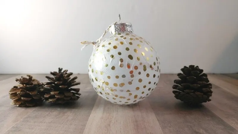 Easy Ornaments to Make Yourself- These Christmas ornaments are SO simple to make, anyone can do it in just minutes using supplies you already have in your craft closet. Glitter, scraps of fabric and a little craft paint and you have some gorgeous custom ornaments! #holiday #Christmas #decor #DIY #easy #paint #crafts #crafter 