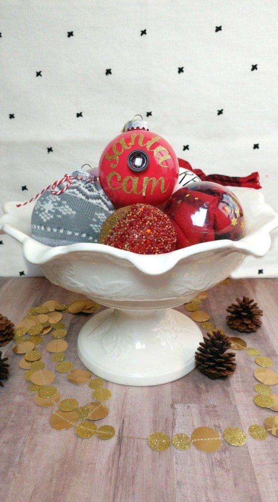 Easy Ornaments to Make Yourself- These Christmas ornaments are SO simple to make, anyone can do it in just minutes using supplies you already have in your craft closet. Glitter, scraps of fabric and a little craft paint and you have some gorgeous custom ornaments! #holiday #Christmas #decor #DIY #easy #paint #crafts #crafter 