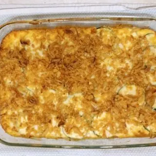 This cheesy au gratin zucchini recipe is the perfect blend of healthy and comfort food! Gooey, melty cheese and fresh, nutritious zucchini! The perfect side dish recipe for any dinner, and bonus: it's easy! Gluten free | low carb | LCHF | recipe | dinner ideas | kids | vegetables | healthy | side dish |