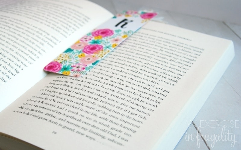 book on wood background with colorful bookmark