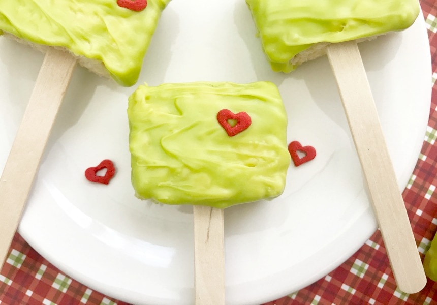 Grinch themed rice krispie treats on a plate