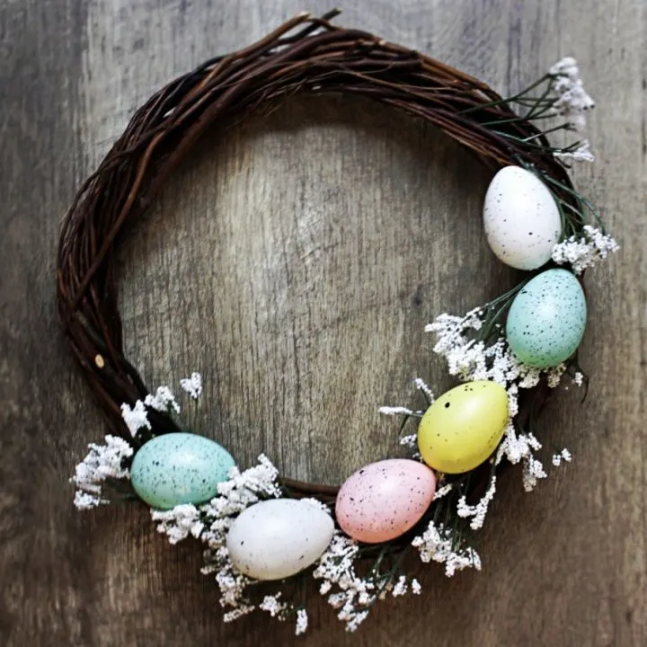 grapevine wreath with pastel speckled Easter eggs