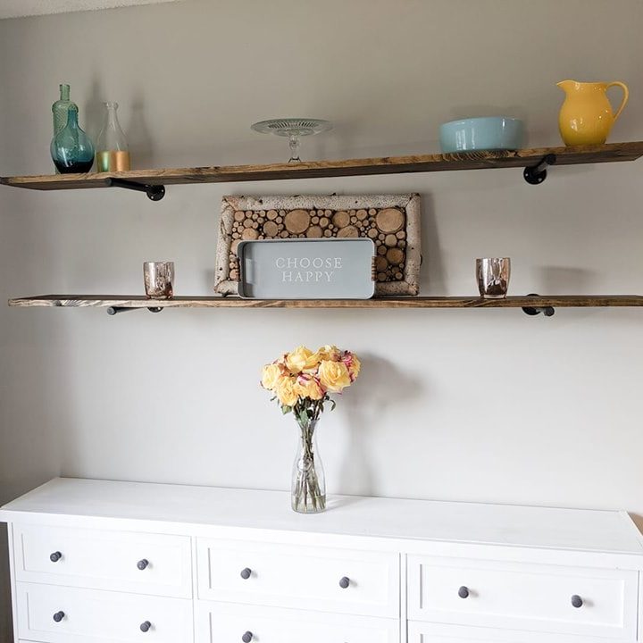 rustic shelves above a white farmhouse cabinet