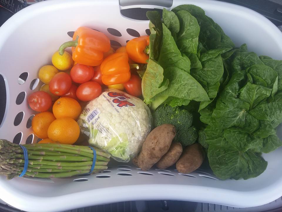 assorted produce in a white basket