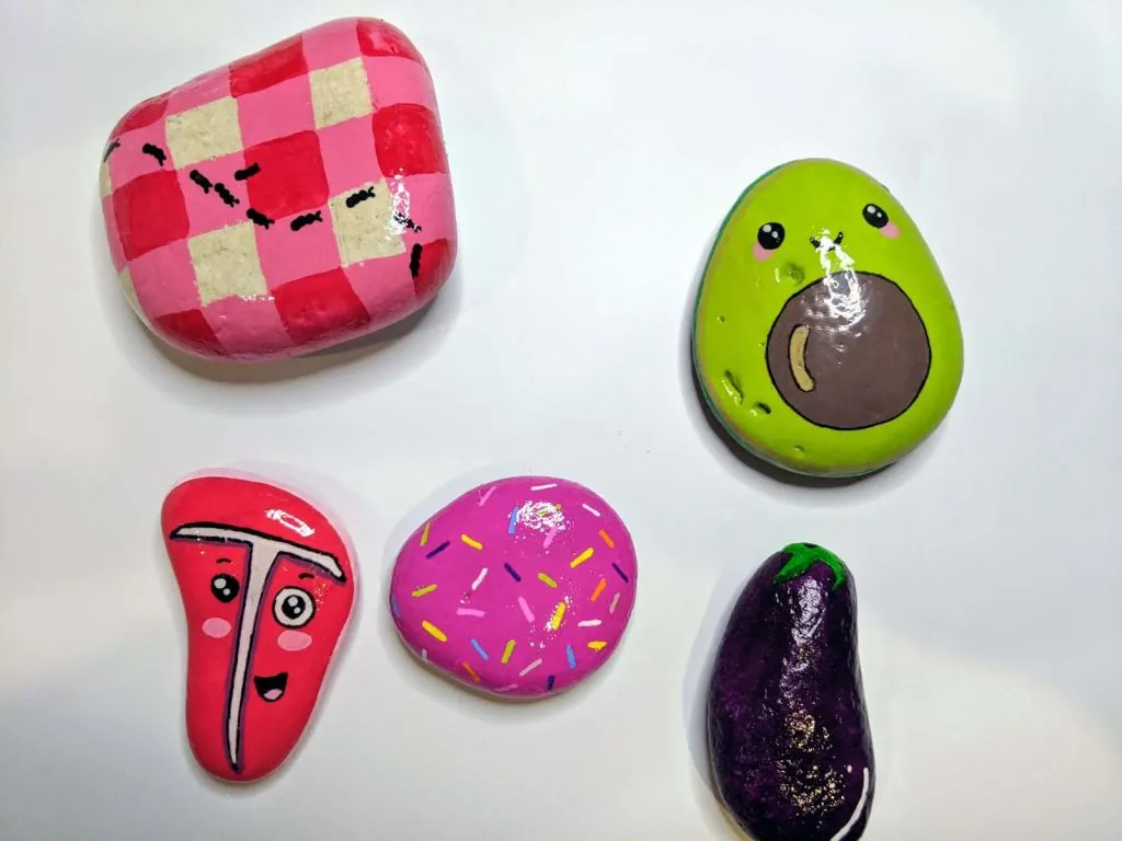 five colorful painted rocks 