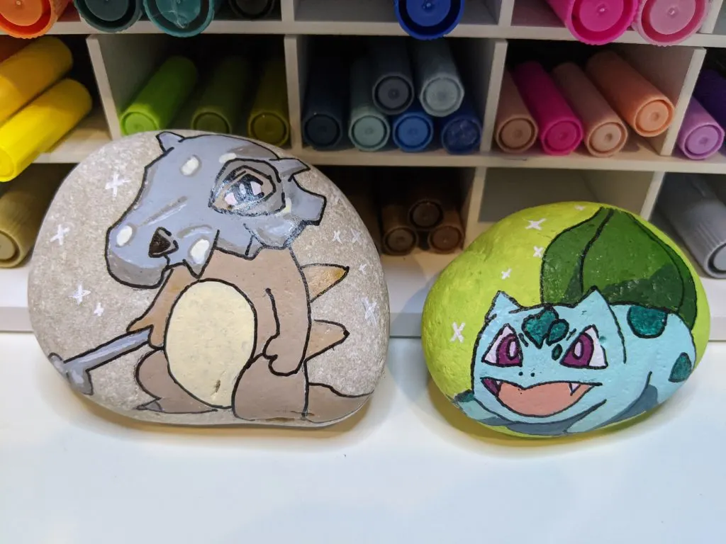 rocks painted with cubone and bulbasaur pokemon